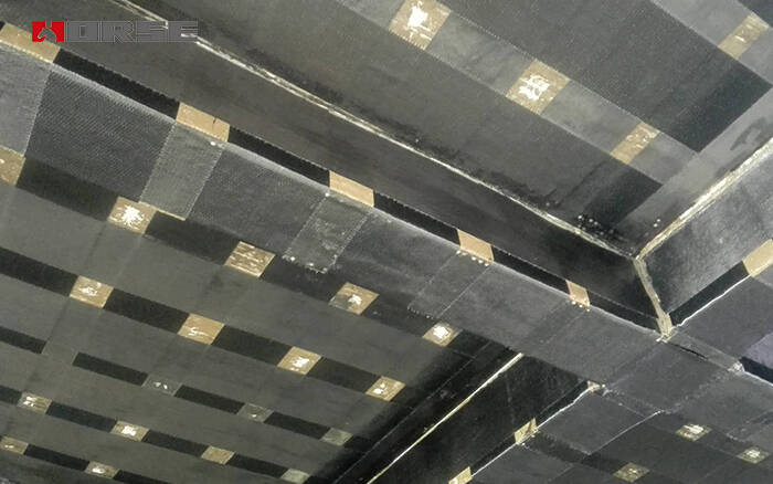 Carbon fiber retrofitting of concrete beams and slabs Carbon fiber retrofitting of concrete beams and slabs