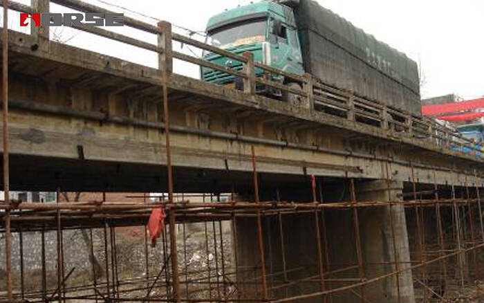 Prestressed CFRP laminate for reinforced bridge Prestressed CFRP laminate for reinforced bridge