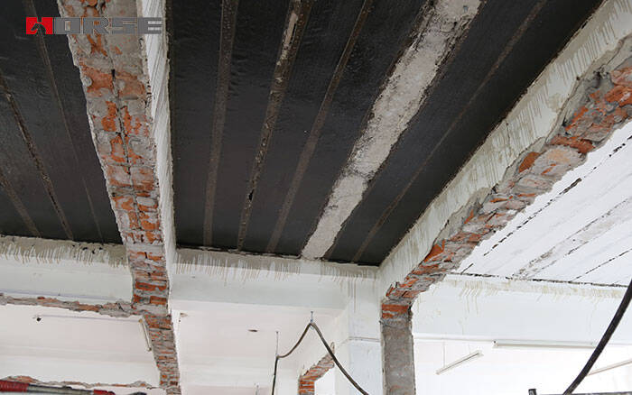 Carbon fiber wrap reinforced masonry structure Carbon fiber wrap reinforced masonry structure