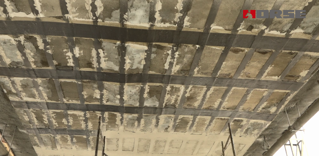 Reinforced Exposed Concrete Bridge With Carbon Fiber and Plate Reinforced Exposed Concrete Bridge With Carbon Fiber and Plate